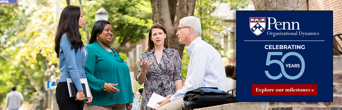 Organizational Dynamics graduate students chatting